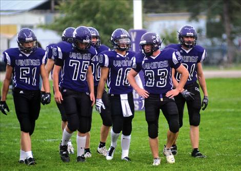 Charlo football players push each other to be better, even practing running routes and passing every Monday, according to senior quarterback #10 Tra Ludeman, above center.