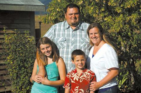Eleven-year-old Kyla Blixt, left, is credited with saving dad Shawn Blixt’s life after he rescued Kyla’s brother Kaden, center, from a near-drowning experience and began to drown himself. Mom Ambree is also shown in this family photo. 