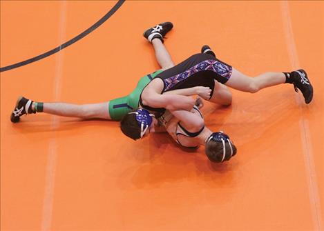 Polson Lady Pirate Skyla Nielsen wrestles a Ronan Maiden opponent at the Western Montana Duals in Ronan on Jan. 3. The Lady Pirates wrestling team finished first with 94 points. The Ronan Maidens came in third with 85 points.
