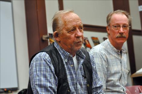 Clyde Olsen speaks to the Charlo School Board about bus drivers' decrease in pay.