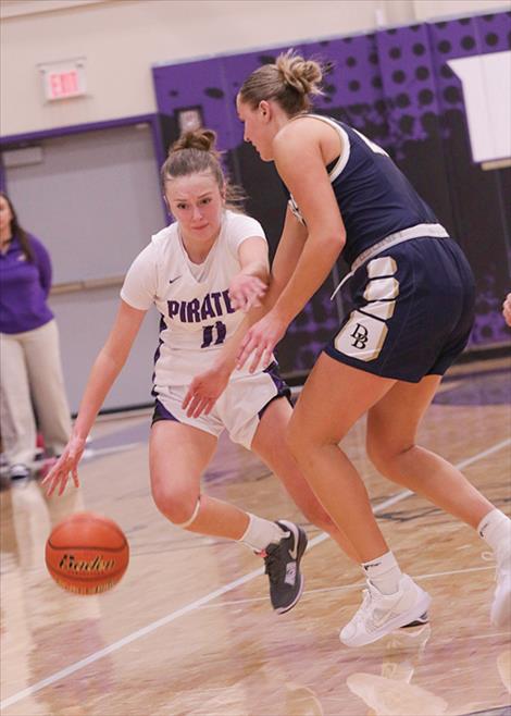 Polson Lady Pirate Hinkley Moss drives to the basket. The Lady Pirates fell to the Dillon Lady Beavers 25-67.