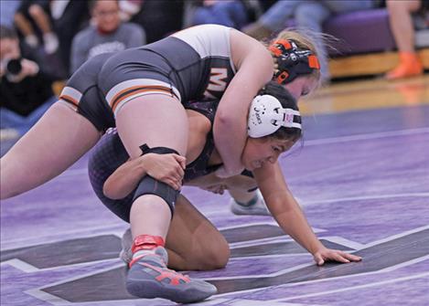 A Ronan Maiden wrestler gains control in a match during the Polson, Ronan wrestling duals on Jan 7.