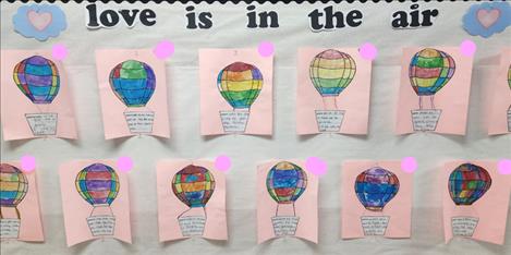Students at Cherry Valley provide definitions of love in their artwork.