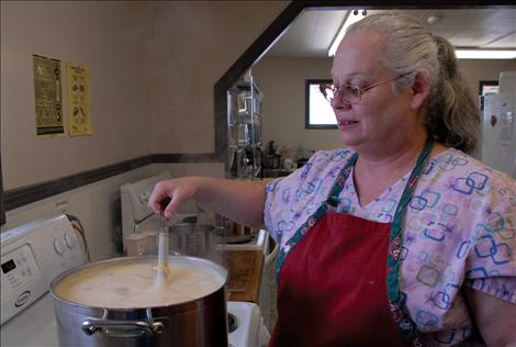 Trish Niblack stirs a hot and hearty pot of soup.