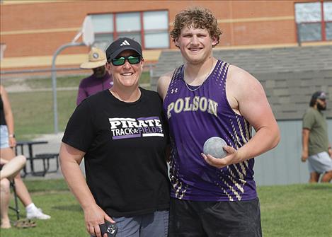 Coach Bree Fuqua and Polson Pirate Astin Brown celebrate Brown’s Shot put victory at the ABC meet in Polson.