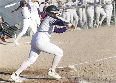 Lizzy Cunningham drives the ball.