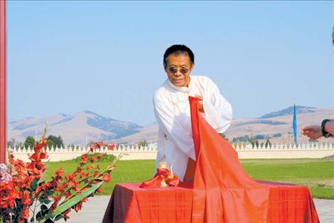 Lama Gochen Tulku Sang-ngag Rinpoche flashes a smile while preparing for the Peace Festival