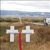White crosses along US 93 near McDonald Lake Road mark the place where two people lost their lives in a highway driving accident.