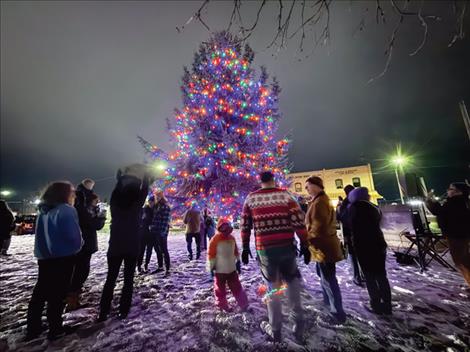 Community members gather on the county courthouse lawn in Polson for the annual Christmas tree lighting on  Saturday, Nov. 29.