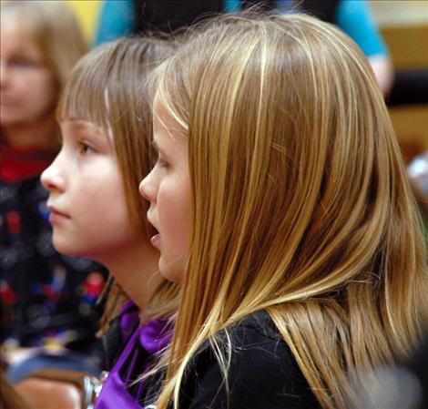 Emily Rehbein and Ashlynn DePoe learn about women getting the vote in Montana.