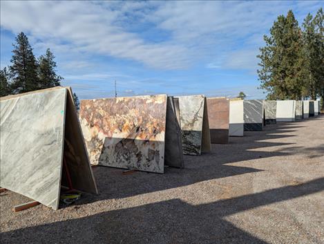 Polson Stone’s slab yard displays a variety of stone options.
