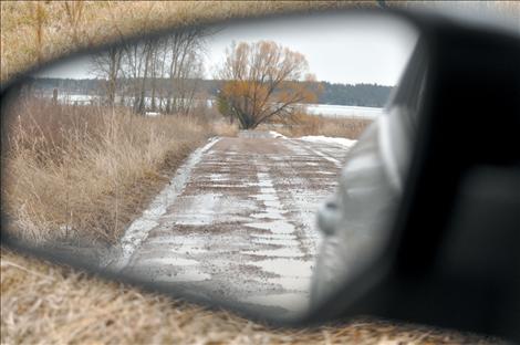 Drivers are urged to use caution around potholes as the spring thaw is expected to continue for months.