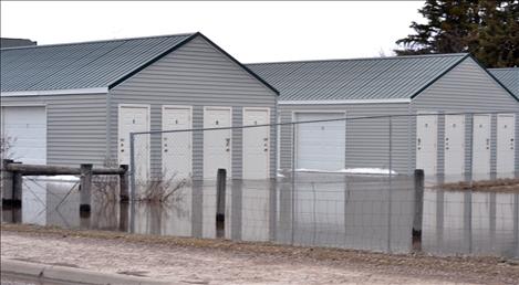 Water levels threatened a storage unit Sunday along Terrace Lake Road in Ronan.