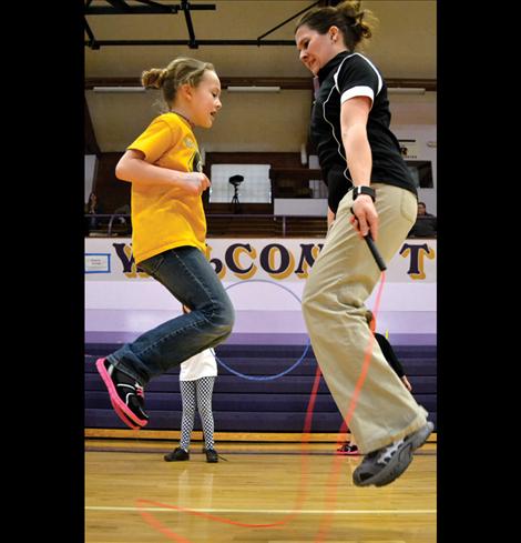 Tyneesha Brown jumps rope with her mother, Rebecca.