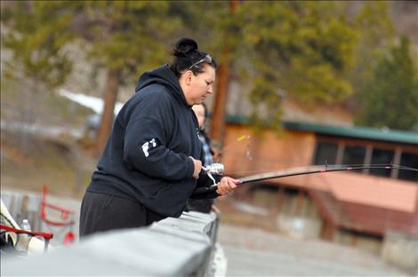 Denise Morgan fishes for lake trout during Spring Mack Days on Flathead Lake.