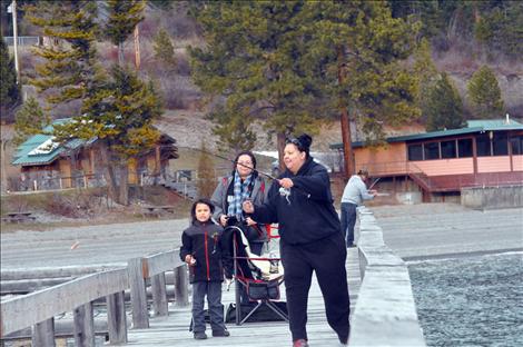 Denise Morgan fishes for lake trout during Spring Mack Days on Flathead Lake.