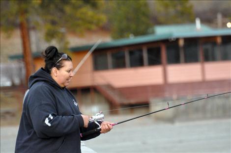 Denise Morgan fishes for lake trout during Spring Mack Days on Flathead Lake.