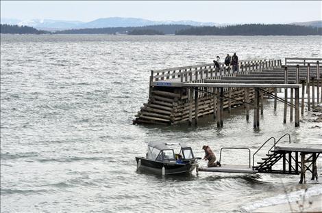 Jerry Benson launches his boat to fish for lake trout during Spring Mack Days on Flathead Lake.