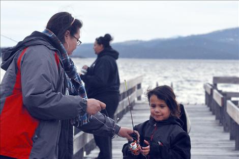 Annie Buffalo, Denise Morgan and Masada Buffalo fish for lake trout during Spring Mack Days on Flathead Lake.