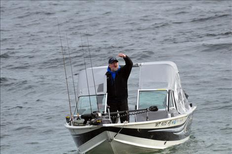 Scott Bombard fishes for lake trout during Spring Mack Days on Flathead Lake.