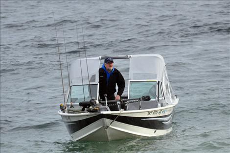 Scott Bombard fishes for lake trout during Spring Mack Days on Flathead Lake. 
