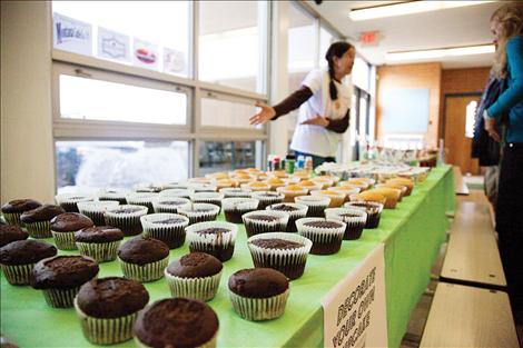 Montana Co-op Kids sell cupcakes made with local ingredients that participants can decorate with icing.