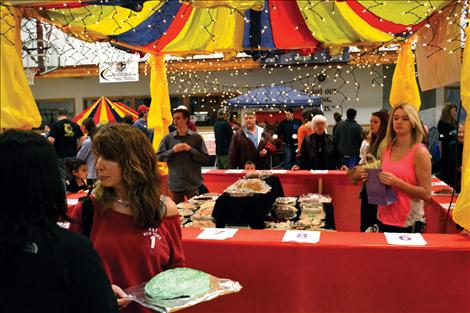 The senior class at Polson High School holds a cake walk at the Winter Carnival.