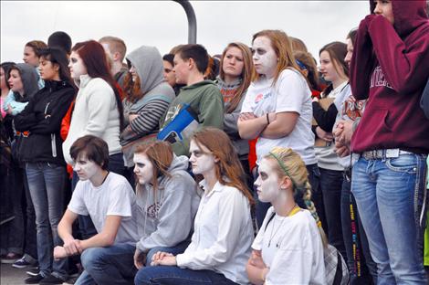 Students represent ghosts, lives lost to drunken driving.