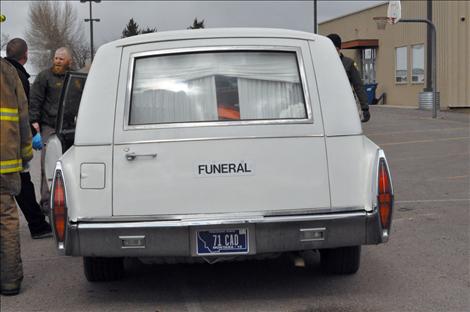 A hearse from a local funeral home was ready to cart off the deceased in the mock drunken driving reenactment.
