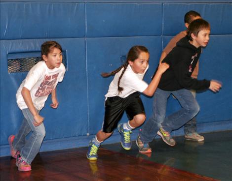 St. Ignatius students are part of the Big Sky Fit Kids Club and put in some gym time before school starts.