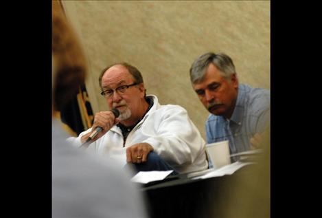 Chris Tweeten, left, chair of the Reserved Water Rights Compact Commission, responds to a question from an audience member. Dan Salomon, (R) HD-12, also is a member of the negotiating team.