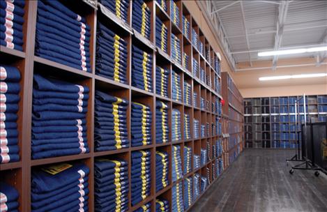 Pairs and pairs of jeans line the wall and other shelves in Murdoch’s, some 20,000 pairs in all.