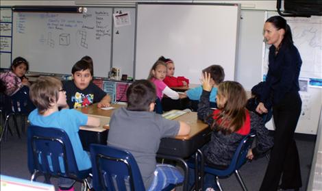 Lt. Governor Angela McLean talks to a classroom of students at Arlee schools.