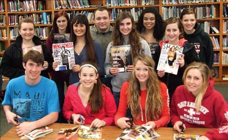 Ronan National Honor Society students from front left, Daniel Aylesworth, Kendra Starkel, Alaina Madsen, McKenzie Dulmes; second row left Cassie Hawkins, , Jasmine Bocksnick, Hannah Bird Rattler, Tyler Sassaman, Hannah McGuyer, Courtney Taylor, Danan DeLaurenti and Cassidy Cheff, work on Magazines for Troops.  