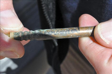 Mark Nelson holds one of several unexploded blasting caps that shut down the North Valley Creek Container Site on April 2.