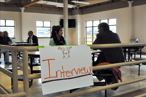Calista Magpie undergoes a mock interview at a St. Ignatius career fair.  