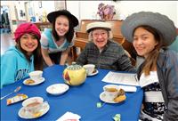 Girls, seniors connect at tea party