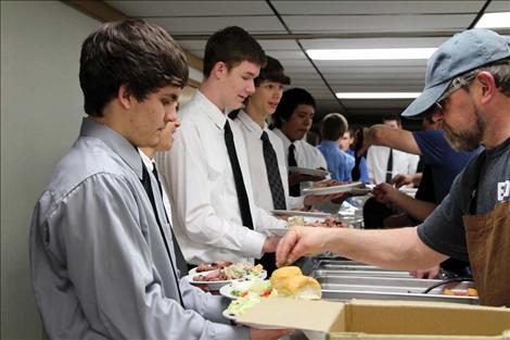 The Mission Valley Mariners don fancy duds to serve up similarly sophisticated grub at a fundraiser.