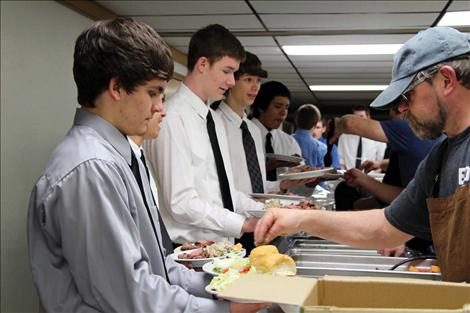 The Mission Valley Mariners don fancy duds to serve up similarly sophisticated grub at a fundraiser. 