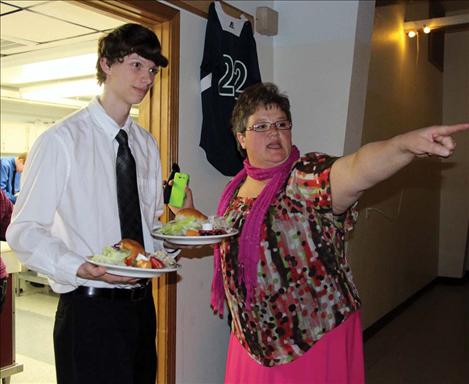 Shelley Croft directs a Mariner server.