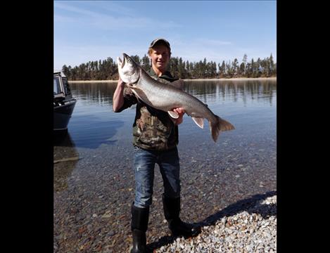 Youth angler Danner Shima holds a 25.5-pound lake trout he landed during week six of the 2014 Spring Mack Days fishing event.