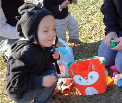 Vance Means enjoys his first bite of Easter candy