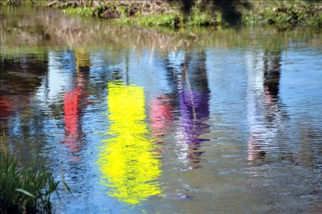 Easter colors illuminate Spring Creek in Ronan's Bockman Park.