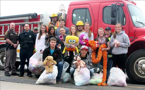 Arlee National Honor Society delivers stuffed animals to the Arlee Volunteer Fire Department.