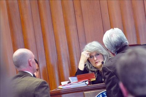 Megan Strickland/Valley Journal Judge Deborah Kim Christopher speaks with opposing counsel  in a trial  meant to determine whether or not a defective steering knuckle played a role in the deaths of three people in a 2011 Lake County crash. 