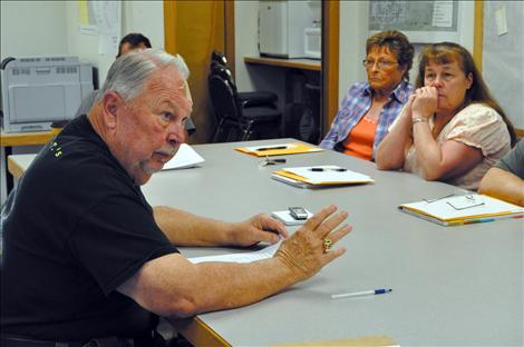 Dennis Lewis tells Ronan City Council members his ideas for improving the Ronan Police Department. 