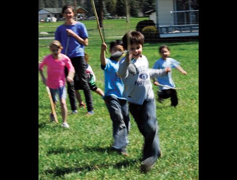 A fast game of double ball provides a fun way to get all the kids involved in a physical activity.