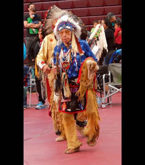 Elder Francis Stanger dances during the Salish Kootenai College powwow.