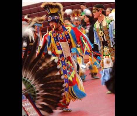 The grand entry on Friday night draws more than 100 dancers to the floor.