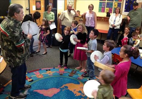 Tony Grant sings and drums with Cherry Valley students as he does during the school days. He also teaches the Kootenai language. 